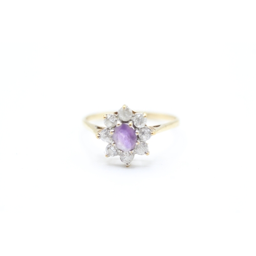 212 - 9ct gold amethyst and cubic zirconia floral cluster dress ring (1.4g)