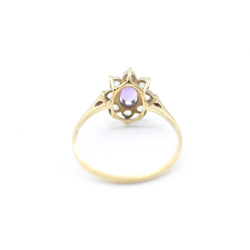 212 - 9ct gold amethyst and cubic zirconia floral cluster dress ring (1.4g)