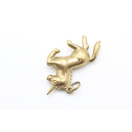 218 - 9ct gold unicorn charm (0.8g)