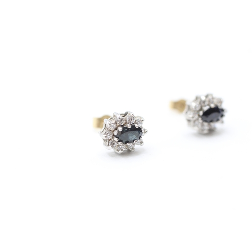 219 - 9ct gold sapphire and cubic zirconia halo stud earrings (1.5g)