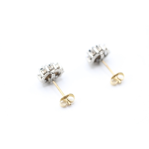 219 - 9ct gold sapphire and cubic zirconia halo stud earrings (1.5g)