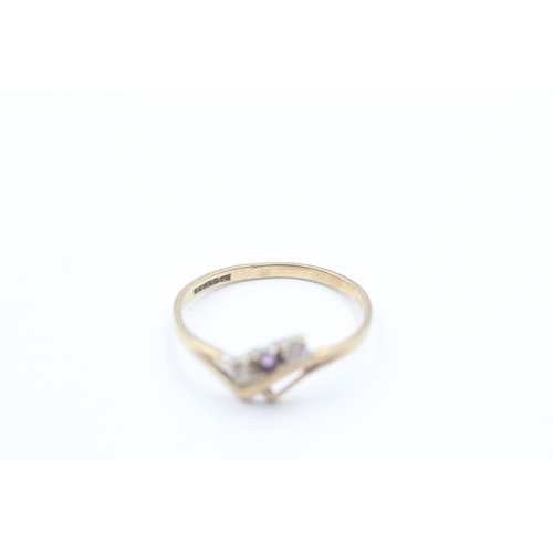 232 - 9ct gold amethyst and cubic zirconia trilogy dress ring (1.3g)