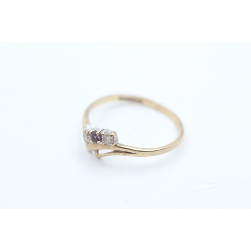 232 - 9ct gold amethyst and cubic zirconia trilogy dress ring (1.3g)