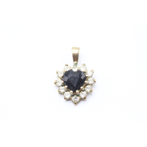 234 - 9ct gold heart cut sapphire and diamond halo pendant (1.4g)