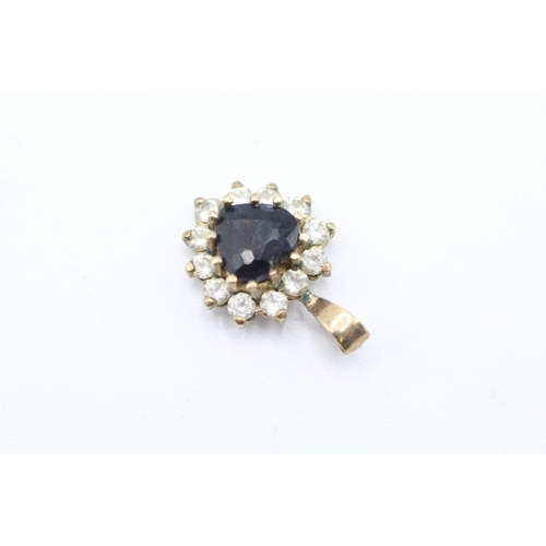 234 - 9ct gold heart cut sapphire and diamond halo pendant (1.4g)