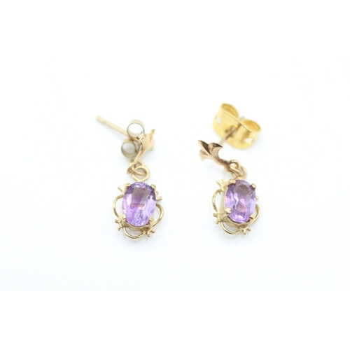 239 - 9ct gold oval cut amethyst drop earrings with posts (1g)