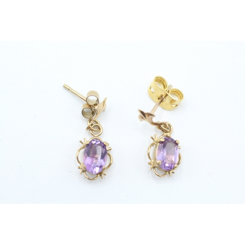 239 - 9ct gold oval cut amethyst drop earrings with posts (1g)