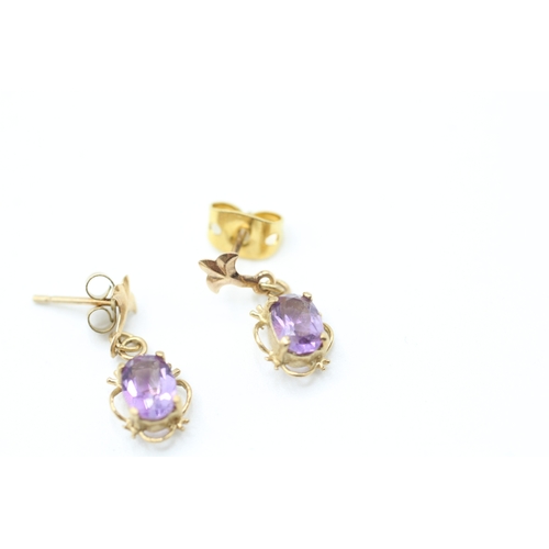 239 - 9ct gold oval cut amethyst drop earrings with posts (1g)