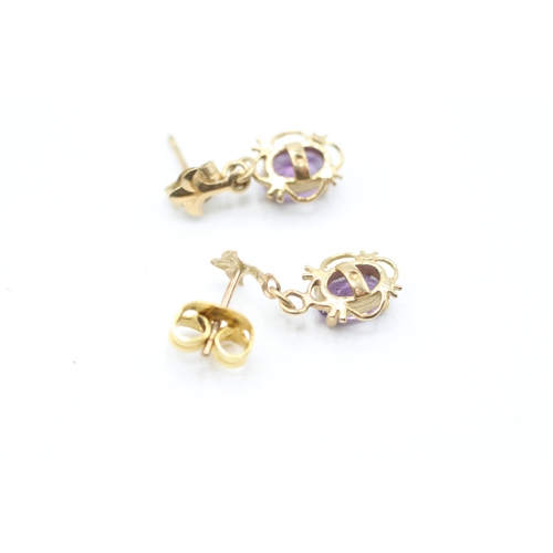 239 - 9ct gold oval cut amethyst drop earrings with posts (1g)