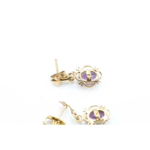 239 - 9ct gold oval cut amethyst drop earrings with posts (1g)