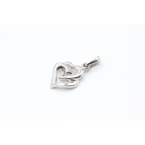 241 - 9ct white gold interlocking hearts pendant (0.7g)