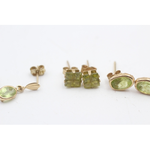 244 - 9ct gold set of three pairs of peridot stud earrings inc. drops (2g)