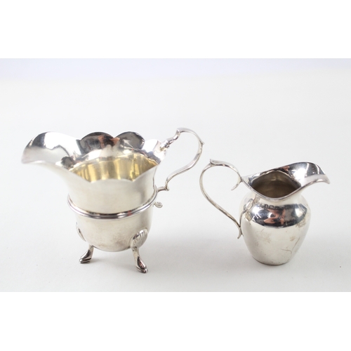 61 - 2 x .925 sterling silver cream jugs