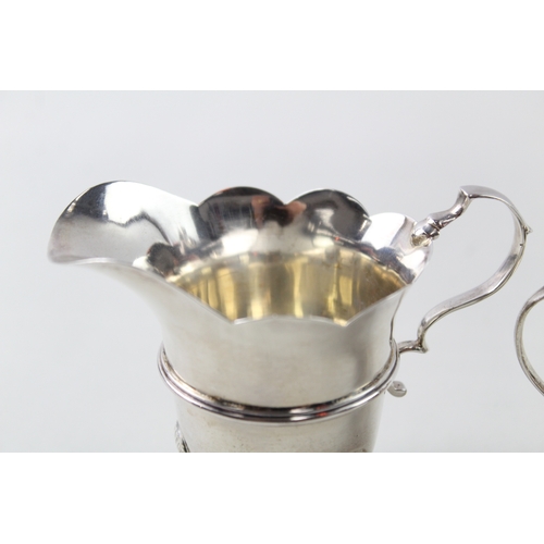 61 - 2 x .925 sterling silver cream jugs