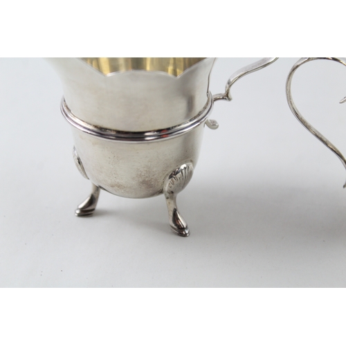 61 - 2 x .925 sterling silver cream jugs