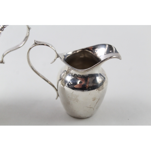 61 - 2 x .925 sterling silver cream jugs