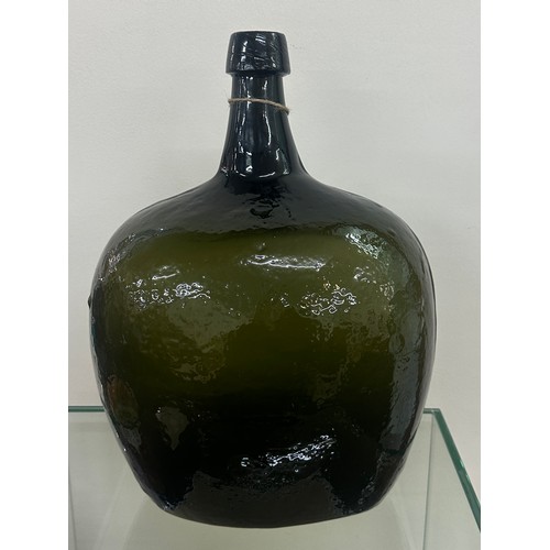 55 - Antique large green glass bottle measures approx 15 inches tall