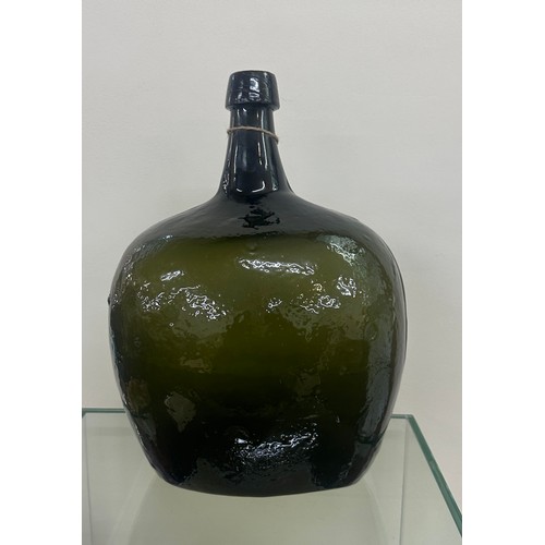 55 - Antique large green glass bottle measures approx 15 inches tall