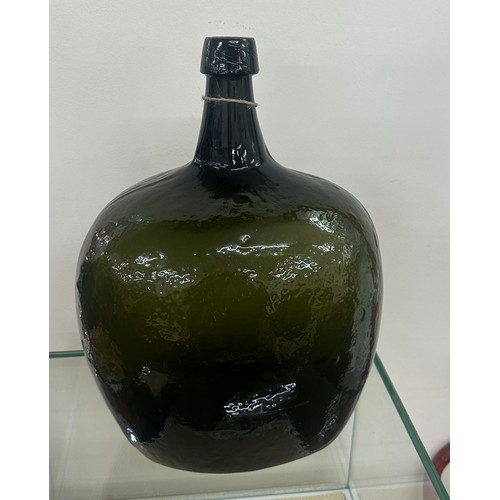 55 - Antique large green glass bottle measures approx 15 inches tall