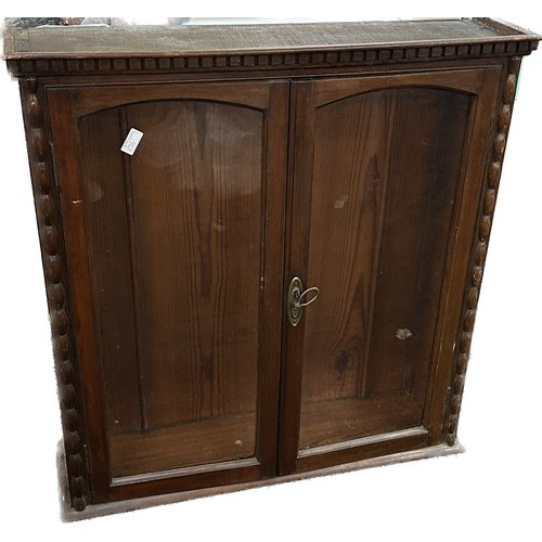 370 - Glass fronted two door cabinet measures approximately 32 inches wide by 34 inches tall