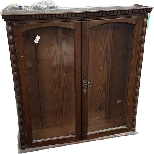 370 - Glass fronted two door cabinet measures approximately 32 inches wide by 34 inches tall