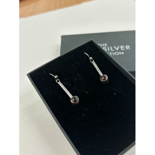 534 - Silver Stone set garnet earrings by Adrian Gerald Benney