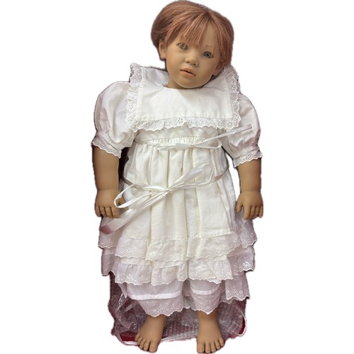 89 - Boxed Annette Himstedt doll, 'Liliane', with red shoulder length hair in white costume, height 63cm ... 