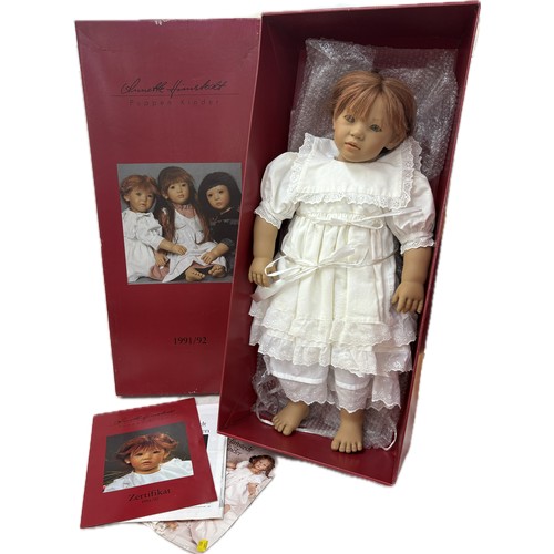 89 - Boxed Annette Himstedt doll, 'Liliane', with red shoulder length hair in white costume, height 63cm ... 