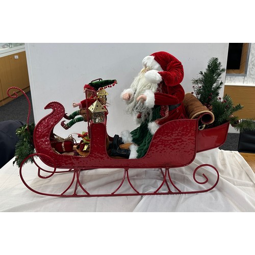 324 - Santa and Elf, metal sleigh Christmas decoration, approximate measurements: Length 35 inches, Height... 