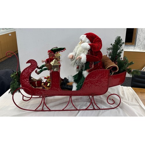 324 - Santa and Elf, metal sleigh Christmas decoration, approximate measurements: Length 35 inches, Height... 