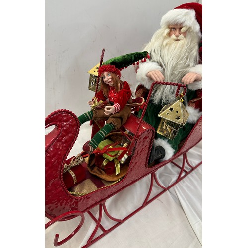 324 - Santa and Elf, metal sleigh Christmas decoration, approximate measurements: Length 35 inches, Height... 