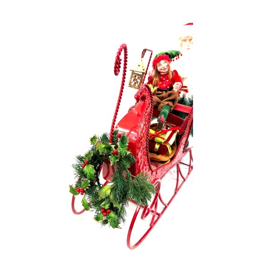 324 - Santa and Elf, metal sleigh Christmas decoration, approximate measurements: Length 35 inches, Height... 