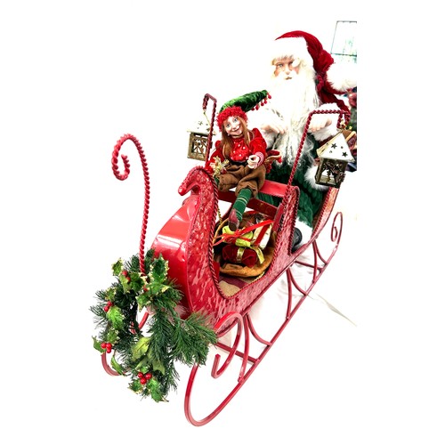 324 - Santa and Elf, metal sleigh Christmas decoration, approximate measurements: Length 35 inches, Height... 