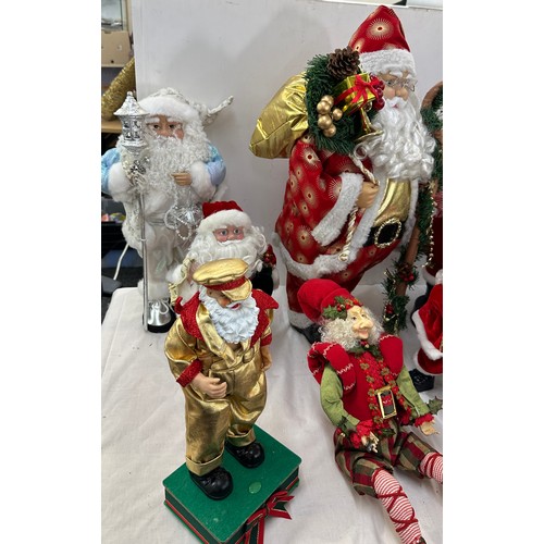 345 - Freestanding Santa, selection Santa decorations/figures, elves etc tallest piece measures approximat... 