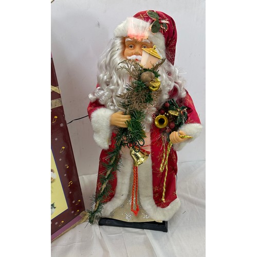 343 - Boxed Fibre optic, singing colour changing Santa Christmas decoration, overall height 24 inches, wor... 