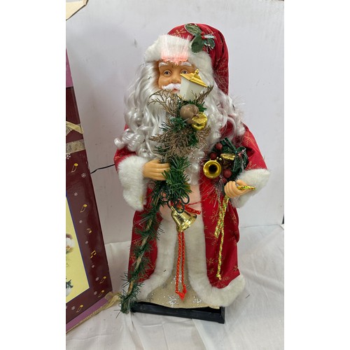 343 - Boxed Fibre optic, singing colour changing Santa Christmas decoration, overall height 24 inches, wor... 