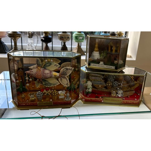 365 - Cased temple bell tower Thailand, 2 oriental display scence's both in cases, largest case measures a... 