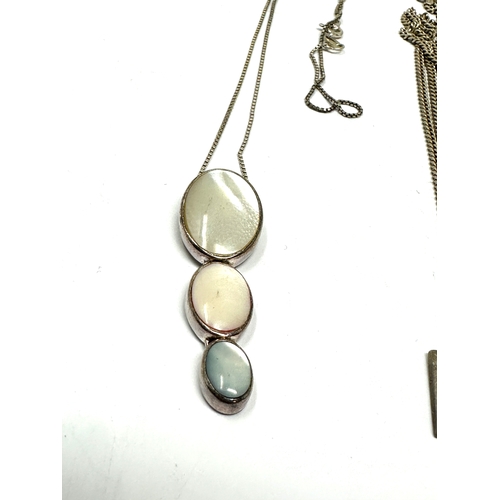 278 - 4 silver pendant necklaces weight 37g