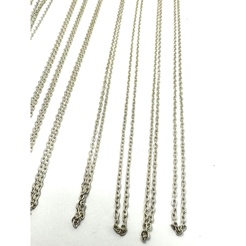 286 - 10 fine silver necklace chains on display card