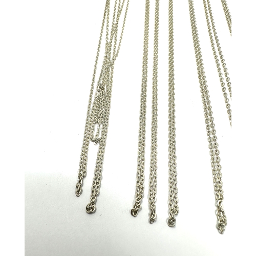 286 - 10 fine silver necklace chains on display card