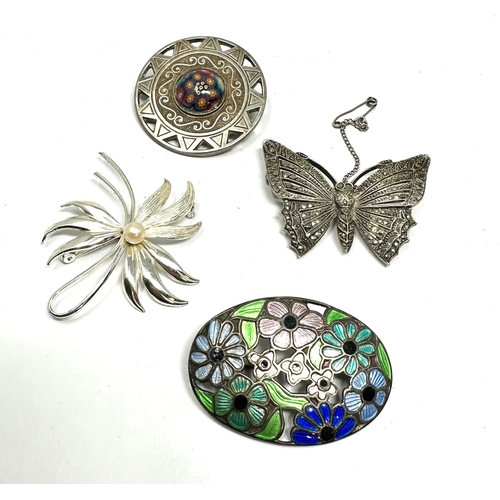 289 - 4 vintage silver brooches weight 52g