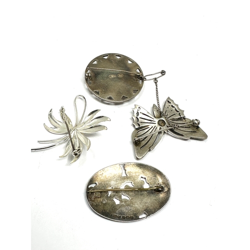 289 - 4 vintage silver brooches weight 52g