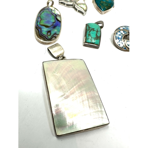 292 - 8 vintage silver gemstone set pendants weight 68g