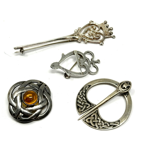 295 - 4 Vintage Scottish silver brooches