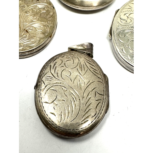 296 - 4 large vintage silver lockets weight 54g largest measures approx 5cm by 4cm