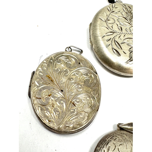 296 - 4 large vintage silver lockets weight 54g largest measures approx 5cm by 4cm