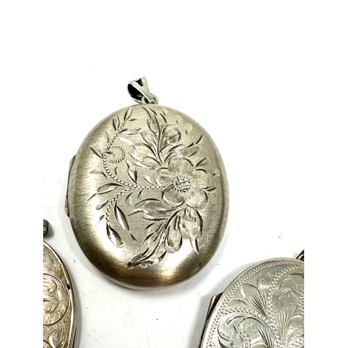 296 - 4 large vintage silver lockets weight 54g largest measures approx 5cm by 4cm