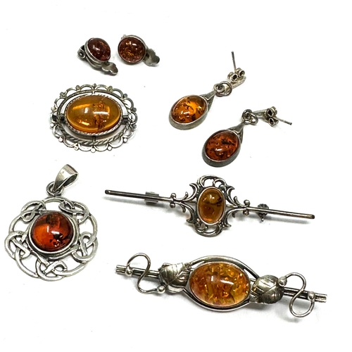 300 - Selection of silver & amber jewellery inc earring pendant brooches