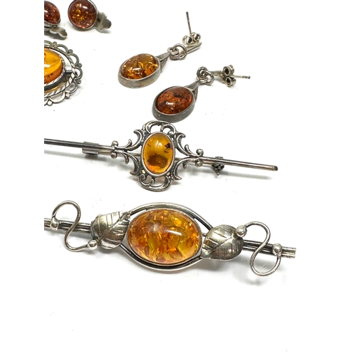 300 - Selection of silver & amber jewellery inc earring pendant brooches