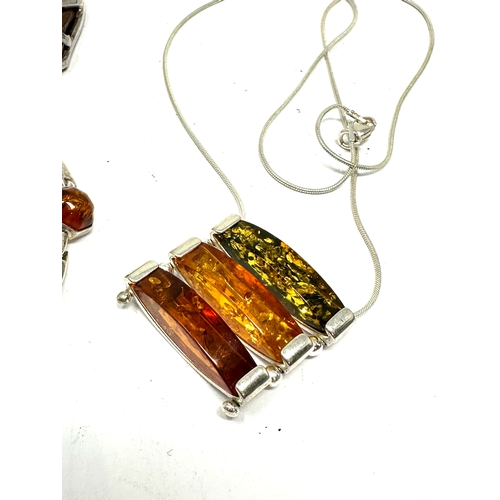 304 - Vintage silver & amber pendant necklace bracelet and pendant